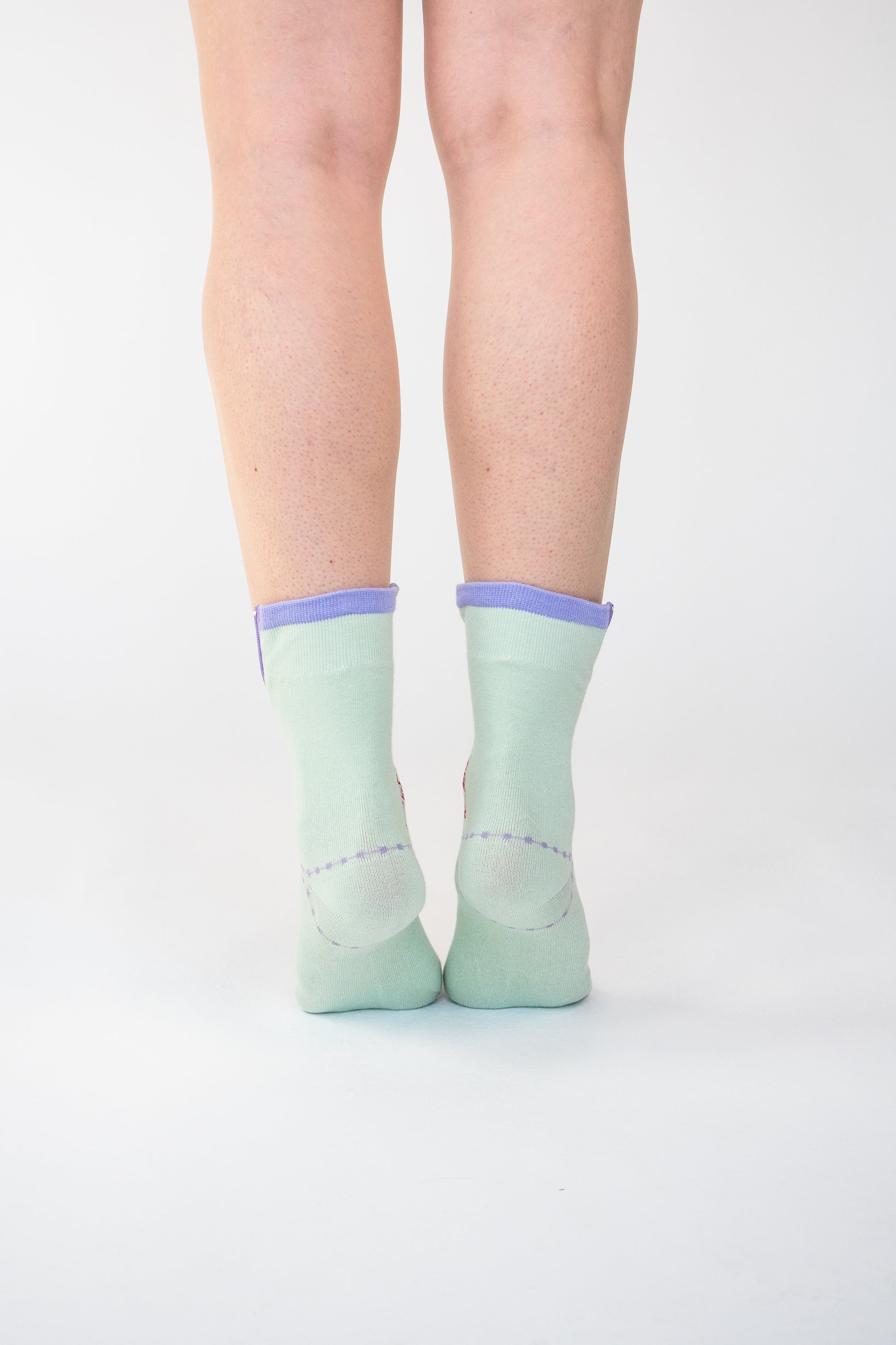 Atypical Attire socks are unique socks and luxury socks. These Lime Purple socks are unisex green cotton socks with a purple zip for a fun quirky style.