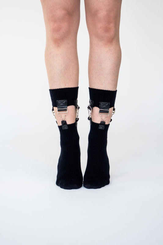 Atypical Attire socks are unique socks and luxury socks. These Ultimate Suspender socks are unisex black cotton socks which contain silver steel dungaree clips and vegan leather.