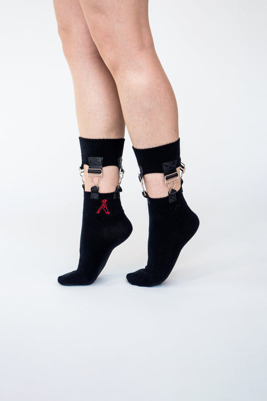 Atypical Attire socks are unique socks and luxury socks. These Ultimate Suspender socks are unisex black cotton socks which contain silver steel dungaree clips and vegan leather.