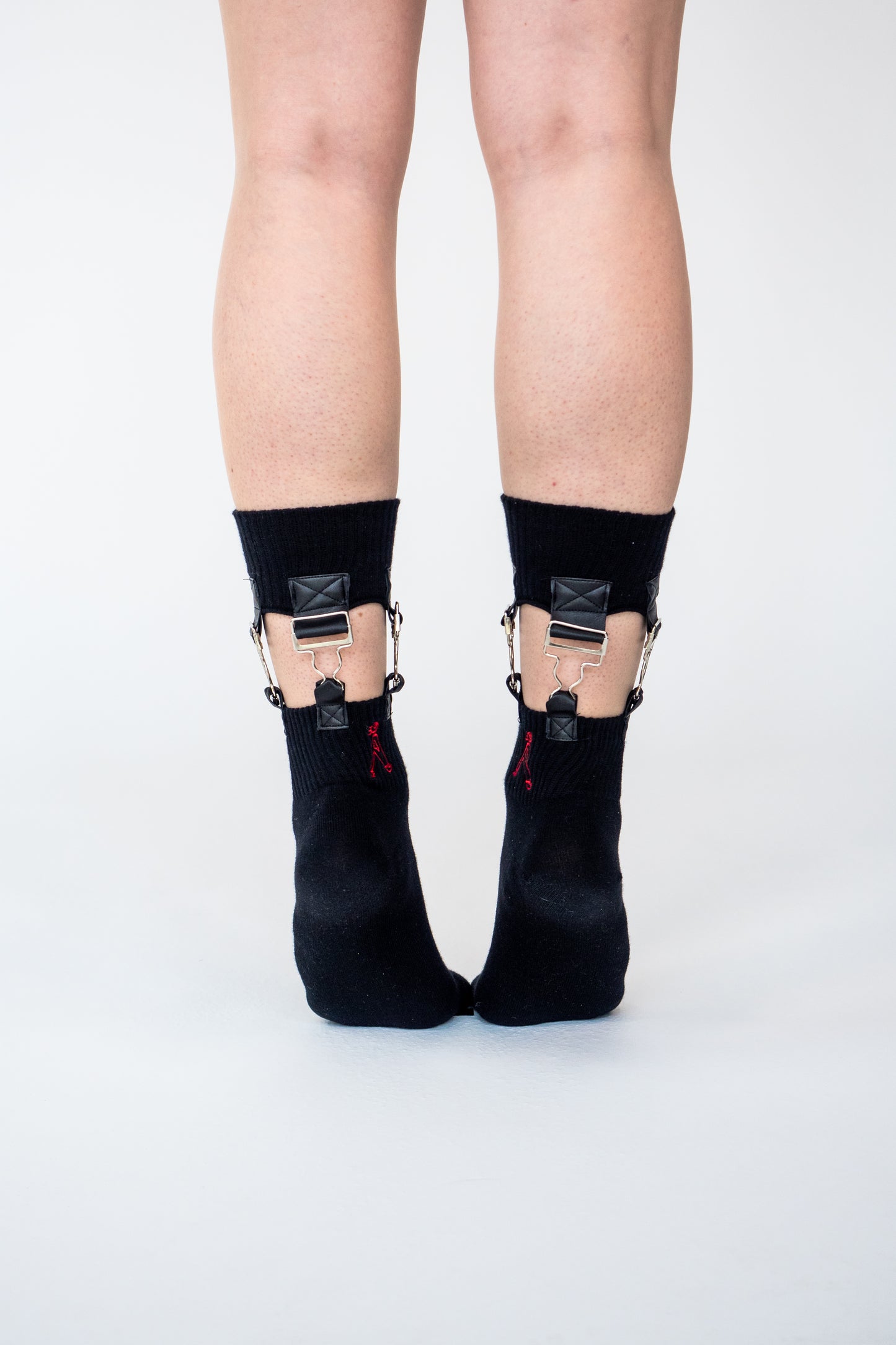 Atypical Attire socks are unique socks and luxury socks. These Ultimate Suspender socks are unisex black cotton socks which contain silver steel dungaree clips and vegan leather.